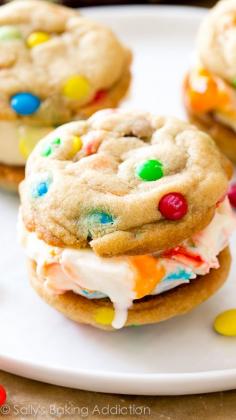 OH YES. The ultimate ice cream sandwich recipe! M&M ice cream cookie sandwiches.. homemade ice cream no machine required!!