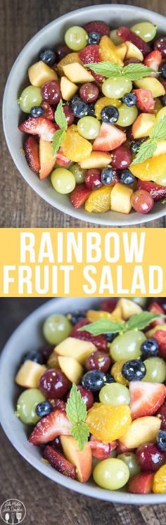 Rainbow Fruit Salad - This colorful and delicious rainbow fruit salad is coated in a sweet honey lime glaze for the perfect side dish, or perfect to take to a summer potluck!