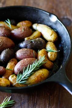 Rosemary Roasted Fingerling Potatoes, made in a cast iron skillet with fresh rosemary. Recipe adapted from Cooking Light.