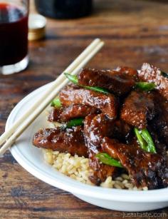HIT! 30-Minute Mongolian Beef (PF Chang's copycat recipe) by justataste: Thin slices of flank steak, minced fresh garlic and ginger, dark brown sugar and soy sauce. Toss it all together and 30 minutes later you’ll be chowing down... #Beef #Flank_Steak #Oriental #Mongolian_Beef. Really good and really easy.