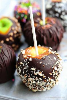 Chocolate Dipped Caramel Apples Recipe They're easier than they look! And so very yummy! shewearsmanyhats.com #chocolate #caramel #apples