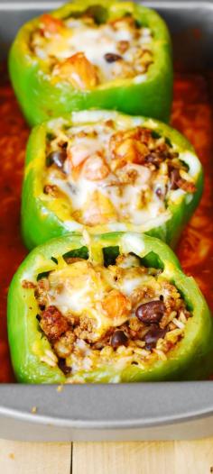 Mexican Stuffed Peppers – stuffed with Mexican ground beef, black beans, rice, tomatoes, cheese. Delicious! Gluten free recipe.
