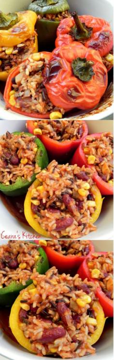 Vegan Stuffed Peppers! Sweet Bell Peppers stuffed with a hearty and filling mixture of tomatoes, wild rice, beans, vegetables and corn. A healthy, gluten free   delicious meal! #vegan #recipes #vegetarian #recipe #easy