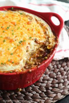 BBQ Chili Shepherd's Pie: a hearty, comforting dish full of smoky barbecue chili flavours, covered in garlic mashed potatoes and cheese. ~ The Recipe Rebel