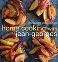 Join one of the world's greatest chefs in his most personal book yet, as Jean-Georges Vongerichten shares his favorite casual recipes in Home Cooking with Jean-Georges. Though he helms a worldwide restaurant empire-with locations in New York, Las Vegas, London, Paris, and Shanghai-Jean-Georges counts his greatest joy in life as family first, then food. In Home Cooking with Jean-Georges, he brings readers into his weekend home, where he cooks simple, delicious dishes that leave him plenty of time to enjoy the company of friends and loved ones. A few years ago, Jean-Georges decided to give himself a gift that most of us take for granted: two-day weekends. He and his wife, Marja, and their family retreat to their country home in Waccabuc, New York. There, the renowned chef produces the masterful, fresh flavors for which he is known-but with little effort and few dishes to clean at the end. These quick, seasonal, Vongerichten-family favorites include: Crab Toasts with Sriracha Mayonnaise, Watermelon and Blue Cheese Salad, Herbed Sea Bass and Potatoes in Broth, Lamb Chops with Smoked Chile Glaze and Warm Fava Beans, Parmesan-Crusted Chicken, Fresh Corn Pudding Cake, Tarte Tatin, and Buttermilk Pancakes with Warm Berry Syrup. With 100 recipes and 100 color photographs-all taken at his country house-Home Cooking with Jean-Georges will inspire home cooks with fantastic accessible dishes to add to their repertoires. From the Hardcover edition.