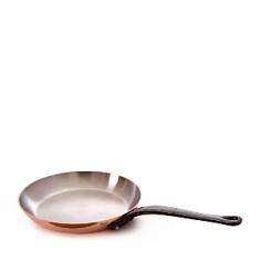 This 11.75-in. Mauviel Extra Thick Skillet is ideal for sautes, stir-fries, and other searing tasks. It's crafted from copper and has a stainless steel interior that won't interact with foods and makes for easy cleaning. Copper is a terrific choice for cookware because it is twice more conductive than aluminum and ten times more conductive than stainless steel. No wonder copper is the most preferred material of cookware by popular chefs and avid home cooks; its ability to heat up evenly and rapidly and to cool down just as quick allows for maximum control and excellent cooking results. Please handwash with mild dish soap. Made in France. The Cuprinox cookware line features an extra-thick 2.5mm copper exterior and includes a thin layer of stainless steel on the interior of the line's pots and pans. The stainless interior resists sticking, doesn't react with acidic foods, and cleans easily with a sponge. The cookware also offers durable handles anchored with rivets that hold up to heavy use. Mauviel, a French family business established in 1830 and located in the Normandy town of Villedieu-les-Poeles, is the foremost manufacturer of professional copper cookware in the world today. Highly regarded in the professional world, with over 170 years of experience, Mauviel offers several different lines of copper cookware to professional chefs and home cooks that appreciate the benefits of their high quality products.
