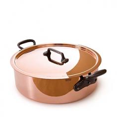 One of our favorite ways to cook and serve delicious one-pot meals. This elegant and efficient Dutch oven is ideal for everything from braising and browning to stewing and slow cooking. Tight-fitting lid seals in moisture while you cook and keeps food warm till youâ re ready to serve. Stay-cool, ergonomic cast iron handles are securely riveted to pan for a lifetime of use. Stainless-steel interior is easy to clean, and polished copper exterior retains its good looks for years to come. Compatible with any stovetop heat source, except induction. Oven and broiler safe. 6.4-quart capacity. Hand wash. Lifetime warranty. Hand made in France. Mâ HERITAGE 150 COPPER COLLECTION Mauviel combines two powerful materialsâ 90% copper and 10% 18/10 stainless steelâ to create cookware of unsurpassed quality. The 1.5-mm copper exterior delivers exceptional heat conductivity and control, and the stainless steel lining is non-reactive, preserving the flavor and nutrients of food. Chefs around the world rely on this durable cookware, which is guaranteed for life against manufacturing defects.