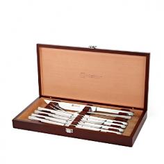 High carbon 18/10 stainless steel. Polished 18/10 stainless steel handles. Includes wooden case with rosewood stain. Dishwasher safe. Set includes 8 steak knifes, 2-pc. carving set, wood case. Whether it's beef, bison, or cauliflower steaks, treat it like royalty with the Wusthof Stainless Steel 10 Piece Steak and Carving Set with Presentation Chest. This collection is a beauty to behold and a joy to use. It includes eight stainless steel, serrated edge steak knives, a two-piece carving set, and a stunning wood presentation case with rosewood stain. The blades are sharp, the handles polished to a high sheen, and this would make a fantastic wedding gift. About WusthofSince their humble beginnings in 1814, the Wusthof family business has adhered to the same basic set of principles regarding their products. Their Trident logo is a representation of these principles, a symbol of form, function, and uncompromising quality. Today, Wusthof stands firm behind a strong line of products, including an assortment of more than 350 forged knives, as well as cutting boards, knife blocks, kitchen tools, and scissors, all of which are produced by dedicated workers at state-of-the-art facilities in Solingen, Germany.