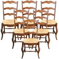 New Dining Chairs Product Details Dimensions (inches): 39H x 19W x 18D Comment: Here's a high-quality set of 6 French Country dining chairs that will work perfectly as your everyday kitchen chairs! Crafted of solid oak with a rush seat, these chairs feature an updated cabriole leg to modernize its look. Other quality details include wavy ladderback splats, matching apron, and turned stretchers with a lovely spindle detail. The natural oak finish will complement your antique French Country dining table or your rustic breakfast table! Use these high-quality chairs for everyday dinners or to provide extra occasional seating during holidays and other large gatherings. These chairs will work perfectly at the mountain cabin or lake cottage. Durable and attractive, this set of 6 chairs offers great value. Best of all, these chairs are sold in pairs, so you can order more chairs if needed. Each chair measures about 40 inches high by 19 inches wide. Date: New Color: Oak Availability: ProcessingTime:7-84 Condition of this New Dining Chairs Condition: NEW REPRODUCTION This is a newly-made. Additional Information Material: Solid Oak Mark: EuroLux Home Style: French Availability for this Dining Chairs Availability: ProcessingTime:7-84 Date: New Material: Solid Oak Color: Oak Style: French Mark: EuroLux Home Cabriole Shipping for this Dining Chairs