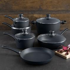 Cookware Sets - Scanpan's mission statement says it all: "Making cooks' lives easier." On the forefront of cookware technology, this Danish company uses a patented ceramic-titanium nonstick process to craft pots and pans that not only offer foolproof release but also sear, brown, deglaze and make sauces. Made with extra-thick pressure cast aluminum for excellent heat distribution and superior heat retention with no hot spots. Tempered glass lids let you monitor the cooking process. Made in Denmark. Full lifetime warranty. Product Features Patented ceramic-titanium nonstick technology consistently wins top nonstick cookware ratings from leading consumer publications Extra-thick pressure-cast 100% recycled aluminum base ensures excellent heat distribution with no hot spots and superior heat retention Ideal for frying without added fat, and for searing, browning, deglazing and making sauces Tempered glass lid is heat- and chip-resistant and has stay-cool knobs Patented spring-lock handle - Specifications Made from pressure cast 100% recycled aluminum Made in Denmark 10 1/4" Fry Pan: 10 1/4" Dia. (17 3/4" w/handle) x 1 1/2"H; Weight: 2 lbs. 2 3/4 qt. Covered Saute Pan: 10 1/4" dia. (17 3/4"L w/handle) x 2 1/2"H (5 1/2" w/lid); Weight: 4 lbs. 4 oz. 1 qt. Covered Saucepan: 6 1/4" Dia. (13"L w/handle) x 5 1/2"H with lid 2 qt. Covered Saucepan: 7 1/4" Dia. (8 1/2" w/spouts) (14" w/handle) x 4"H (7" with lid); Weight: 2 lbs. 3 qt. Covered Saucepan: 8" Dia. (15"L w/handle) x 8"H with lid 6.5 qt. Covered Dutch Oven: 10 1/4" Dia. (15 1/2" w/handles) x 9" H with lid Care and Use After each use, wash the item in warm, soapy water. It is easiest to clean the item while it's still warm Make sure that each item is completely clean before you put it away Our pans are dishwasher safe, but please make sure to use a non-toxic and phospha
