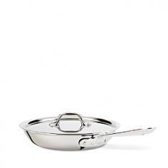 All-Clad Stainless Steel 10? Fry Pan with Lid Perfect Frying, Every Time! Sear, brown and pan fry everything from eggs to meat with the All-Clad Stainless Steel 10-Inch Covered Fry Pan. This pan's flat bottom and flared sides make it easy to toss or turn food with a spatula. Three-ply stainless steel construction offers exceptional heating performance even when using an induction cooktop. The 18/10 stainless steel is naturally stick resistant the extra-long stainless handle is riveted to the body providing an ergonomic and comfortable piece to use in any kitchen. This pan is ideal for cooking with oils and helps food develop rich flavor, bright color and crisp texture. The cast and riveted steel handle stays cool on the cooktop so you can cook safely and comfortably. Made in the USA. Lifetime warranty. About All-CladFor more than 40 years, All-Clad has manufactured top of the line cookware products revered by both working chefs and avid home cooks. All-Clad pieces feature an innovative blend of aluminum, copper and steel and are made in the USA. This Pennsylvania based company regards the quality of its products with the utmost importance, going through rigorous hand inspection at every stage in the process of manufacturing. All-Clad also values environmentally friendly production, recycling materials whenever possiblethey even re-use the metal dust created during sanding. All-Clad Stainless CookwareThe Stainless line is compatible with all cooktop types, including induction. Premium Stainless Steel Construction Classic Design, high performance and lifetime durability unite in the Stainless Collection, All-Clad's most popular line of cookware. Products in this collection feature an interior core of aluminum for even heating and a polished 18/10 stainless steel exterior and cooking surface for fine culinary performance. All-Clad stainless steel cookware featu