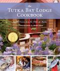 In personal stories, evocative photographs, and recipes that are purposefully simple and designed for the home cook, Chef Kirsten Dixon and her family share fresh, rustic cuisine offering friendship, communicating passion, and bringing comfort and delight to the table. This recipe collection represents the cuisine at Tutka Bay Lodge, the Dixons' seaside lodge nestled within the curve of a quiet cove at the entrance to Tutka Bay, a deep seven-mile fjord in Kachemak Bay, Alaska. In oldworld tradition, Kirsten Dixon's family works together to craft a lifestyle that centers around three themes: the natural world, their culinary lives, and living a life of adventure. The cookbook is organized by sections for breakfast, lunch, appetizers, dinner, and the Cooking School at Tutka Bay. Among the one hundred recipes are Brioche Doughnuts with Cider Black Currant Marmalade, Hot-Smoked Salmon Croquettes, Grilled Oysters with Salmon Bacon and Pernod, Braised Short Rib Ravioli, and Wild Berry Chocolate Shortcake. "Seafood is the star of our cuisine here, as it should be. We certainly serve our share of ocean-caught salmon throughout the entire summer season. Halibut, cod, rockfish, shrimp, and crab also are served nearly daily. We are never too far from the garden in our cooking and many of our recipes include fresh-picked herbs or vegetables that grow well in Alaska. In addition, the wild berries, herbs, mushrooms, and sea vegetables inspire us to remember where on the Earth we live and how lucky we are," Kirsten says.