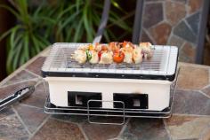 Turn your patio table into an Hibachi table! The handmade clay construction of this Japanese table top grill radiates heat for juicy, tender meats. Uses regular charcoal for that smokey BBQ taste. Includes adjustable ventilation and a large cooking surface. High fired ceramic clay construction. Adjustable ventilation. Compact size for table top grilling. Large cooking surface. 17.73 in. L x 10.24 in. W x 7.09 in. H (18.3 lbs.) Discover what the Japanese have recognized for centuries as the best grill construction clay. The HotSpot Large Yakatori Charcoal Grill is a genuine Japanese table BBQ. Handmade using clay, the Yakatori Grill radiates heat, producing a juicier and more tender meal.