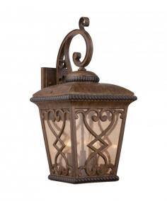 This Fort Quinn lantern with a stunning antique brown finish features a lot of depth and many striations in hues of brown and black that come together to create a truly unique color palette. The amber seedy glass gives the appearance of time gone by and is accented by the lovely scrolling details throughout the base. Setting: Outdoor Fixture finish: Antique Number of lights: Three (3) Requires Three (3) 60-watt incandescent bulbs (not included) Line switch Dimensions: 23 inches high x 11 inches wide x 14.5 inches deep This fixture does need to be hard wired. Professional installation is recommended.