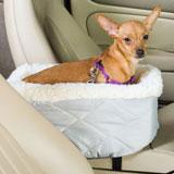 Snoozer console pet car seat with its patented design allows your pet to have the comfort and security of riding next to you while in the car. The design being firm yet comfortable foam form. The snoozer console pet car seat attaches easily to your cars console.