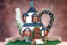 Veronica Romo of Boerne, Texas, crafted beautiful details such as flowering vines and potted plants for her unique teapot gingerbread house....