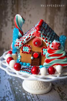 Gum balls, icing and hard candy make this masterpiece shine like the stars and stripes. We wonder if all gingerbread houses should pay homag...