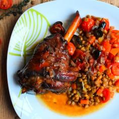 Lamb Shank Stew with Green Lentils
Braised lamb shanks slow cooked in red wine, tomatoes and olives, served on a bed of bay flavoured lentils with carrots and tomatoes.