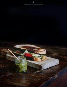 Hot sandwich with pesto, tomato and mozzarella