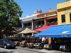 Lygon Street, Carlton, where  Victorian era terrace houses have been converted into rows of restaurants.
