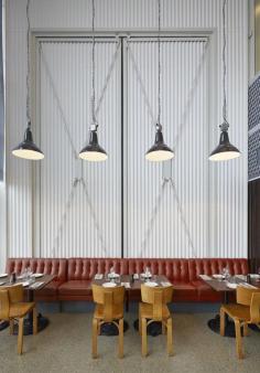 1950s pendant lights + vintage Thonet chairs at Oaxen in Stockholm.