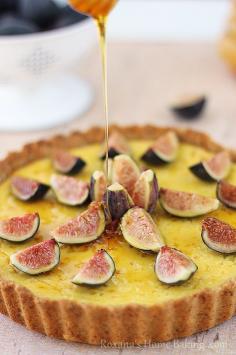 A creamy, sweet ricotta tart brushed with honey and decorated with flagrant fresh figs. Recipe from roxanashomebaking...