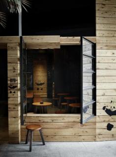 Yarra Lane / Hassell - I enjoy the mixture of the black frame windows and wood walls