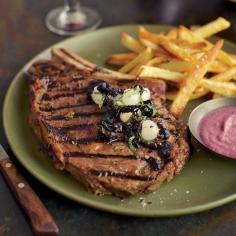 Grilled Steaks with Onion Sauce and Onion Relish | Jonathon Sawyer likes serving grilled meat, like these rib eye steaks, with a tangy sauce that he makes by simmering red onions and jalapeños with water and vinegar, then pureeing them until silky.