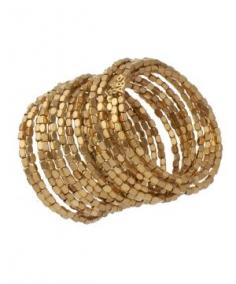 Gold coil bracelet is magnificent. Yellow gold plated beads cover the entire surface of this fabulous bracelet. The bracelet wraps around your wrist in a magnificent coil as it works its way slightly up your arm. Bracelet fits most wrists. $150.00 by Max & Chloe