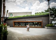 Starbucks senior designer David Daniels has sent us photos of their recently completed contemporary designed location in Downtown Disney, Orlando, Florida.