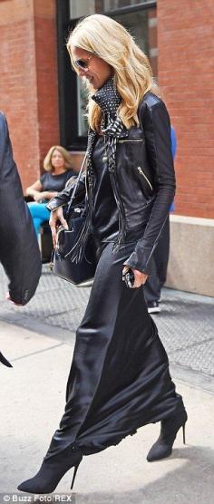 Heidi Klum looks runway ready in black satiny top and skirt in NYC #dailymail