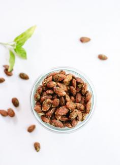 Basil pesto almonds, a great snack to keep on hand or appetizer to serve guests! cookieandkate.com