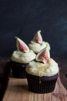 Dark chocolate cupcakes topped with honey-drizzled figs