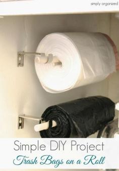 A clever, space-saving DIY project for keeping those huge rolls of garbage bags handy and easy to grab.