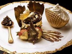 The world's most expensive cupcake! Costing a mere 3676 dirhams, or $957, the world’s most expensive cupcake is made from 23-carat edible gold sheets, organic strawberries and plenty of edible gold dusting.