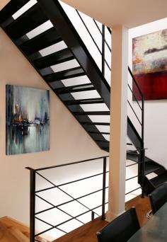 
                        
                            Stairwell with art
                        
                    