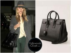 
                    
                        Rosie Huntington-Whiteley | Los Angeles Rosie touched down in LA recently holding a Saint Laurent medium ‘Sac de Jour’ tote.  You can purchase this from Farfetch for $2,131.00 Buy this here
                    
                