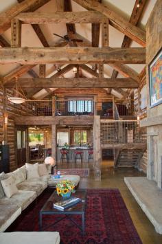 
                    
                        Sundance Lodge - main living area, kitchen, and upstairs loft with cozy couches and TV
                    
                