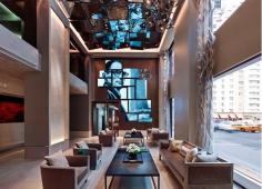 
                    
                        The Quin Hotel New York // Lofted lobby seating area.
                    
                