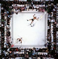
                        
                            In 2003, this was voted the greatest sport photo ever by the Observer. Even Neil Leifer calls it his best shot – one, he says, on which he cannot improve. He’s right. The pristine white canvas is the perfect backdrop, accentuating the two fighters whose figures are so neatly counterposed. I can’t imagine boxing will ever look this sublime again.
                        
                    