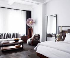 
                    
                        Refinery Hotel New York City // White linens and striped accents.
                    
                