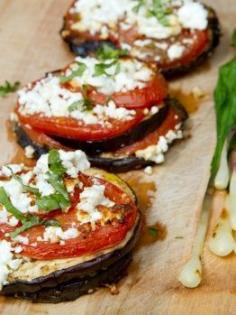 
                        
                            Eggplant, tomato, basil and feta cheese... Salt eggplant, let sit for 30min, pat dry, grill in skillet a few minutes each side. Place in lightly oiled baking sheet, top with evoo/garlic/basil/feta, top with tomato slice, top with more garlic/evoo/basil/feta, and bake at 400F for 15 minutes.
                        
                    