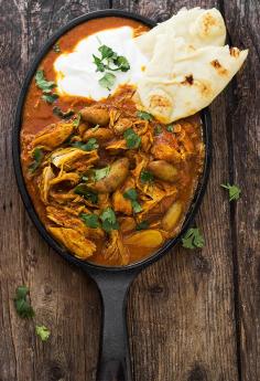 
                    
                        Indian Spiced Stew with Chicken and Potatoes in a Tomato Cream Sauce
                    
                