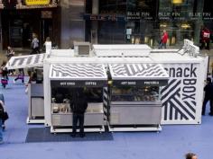 In the heart of New York City, a 6-m-long shipping container has been converted into a transportable restaurant. ‘The SnackBox had to stand out in this visually saturated environment,’ says entrepreneur Jonathan Morr, who created the project alongside ÆDIFICA & MüvBox. The pop-up restaurant is used on Broadway in a section closed to vehicular traffic. By night, the box is closed and locked; by day, the upper walls pivot upwards to create steel awnings.