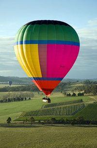 Greet the morning sun as you take flight over the Yarra Valley and its vineyards on a Yarra Valley hot air balloon flight!