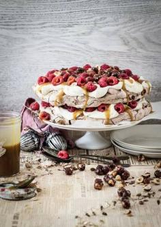 
                    
                        katie's chocolate pavlova with salted caramel, whiskey sauce, raspberries & caramel hazelnuts
                    
                