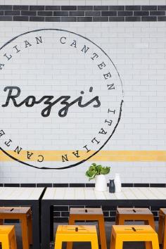 
                    
                        Rozzi's Italian Canteen in Melbourne by Mim Design | Yellowtrace. Like the graphic with circle and font.
                    
                