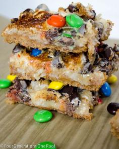 
                    
                        The best m&m cookies & bars on the planet. Easy gooey recipe full of chocolate chips, coconut, marshmallows and m&m's. Perfect after dinner treat or snack.
                    
                