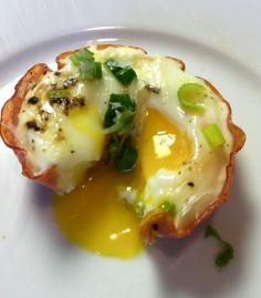 
                    
                        100 Calories of goodness. Baked egg in a ham cup w/ parm cheese + green onions.
                    
                