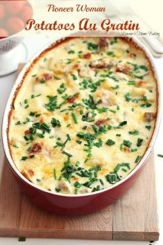 
                    
                        Potatoes au gratin loaded with cheese, cream and garlic. An easy no fuss no mess delicious weeknight meal.
                    
                